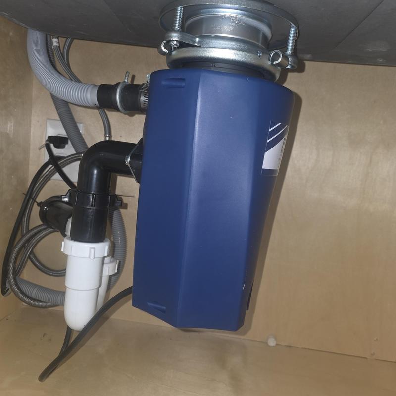 Garbage disposal unit under kitchen sink installation Garbage disposal unit under kitchen sink installation