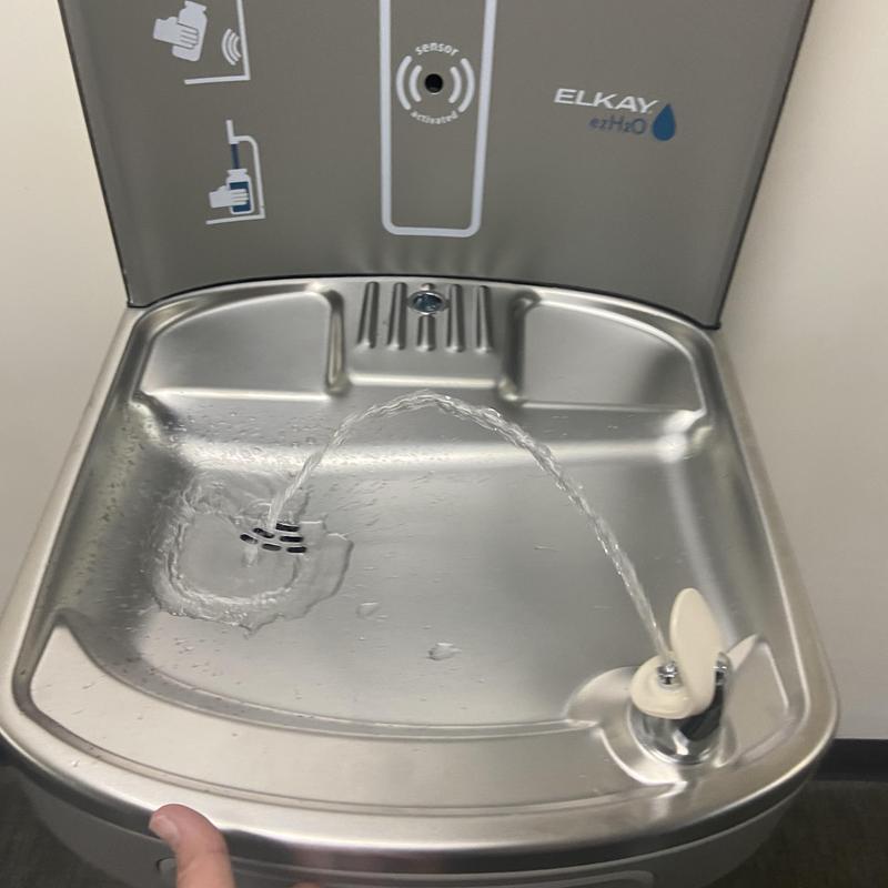 Drinking water fountain with sensor-activated spout Drinking water fountain with sensor-activated spout
