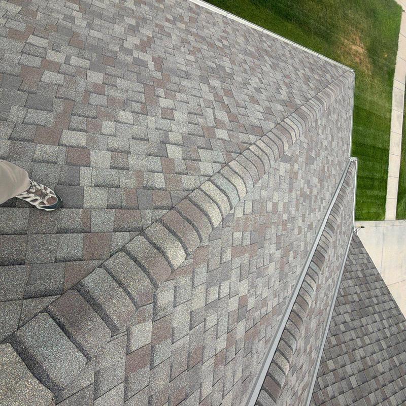 Asphalt shingle roof ridge inspection in Hastings, NE Asphalt shingle roof ridge inspection in Hastings, NE