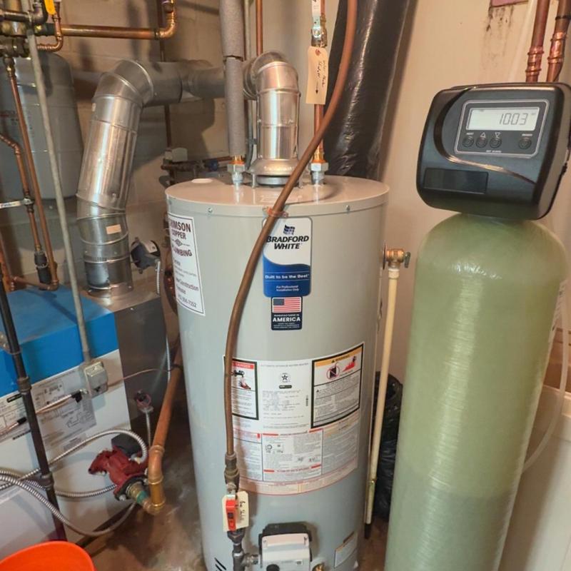 Water heater and water softener system in basement Water heater and water softener system in basement