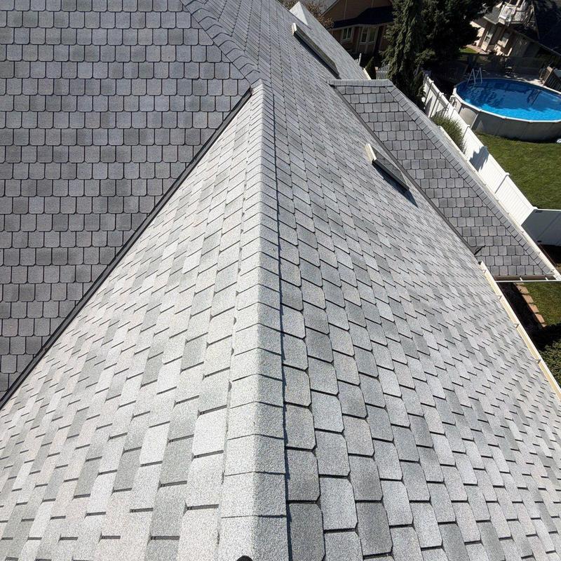 Architectural shingle roof inspection on residential house Architectural shingle roof inspection on residential house