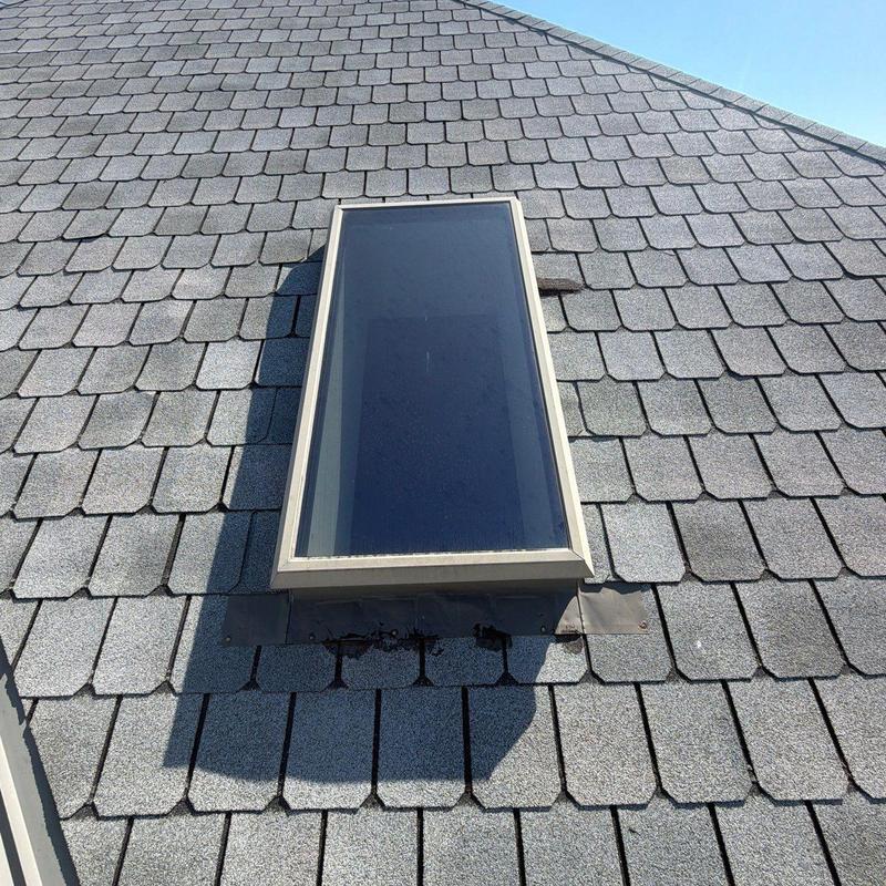 Skylight on asphalt shingle roof in Hastings, NE Skylight on asphalt shingle roof in Hastings, NE