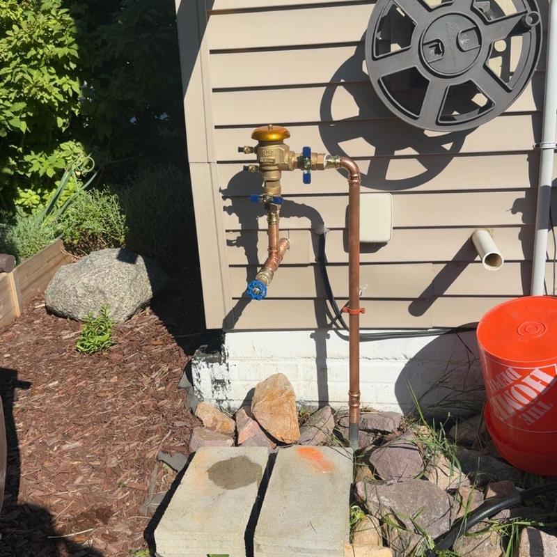 Vacuum breaker and outdoor water piping setup Vacuum breaker and outdoor water piping setup