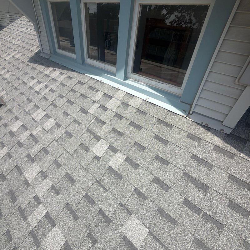 Asphalt shingle roof and window flashing, no damage found Asphalt shingle roof and window flashing, no damage found