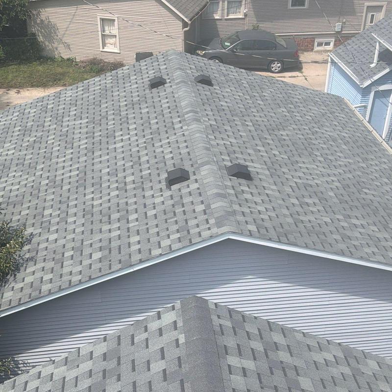 Asphalt shingle roof with ventilation caps in Hastings, NE Asphalt shingle roof with ventilation caps in Hastings, NE