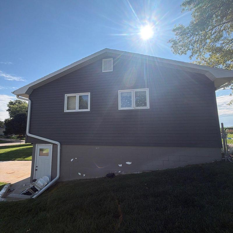 Roof exterior siding and windows on residential home Roof exterior siding and windows on residential home