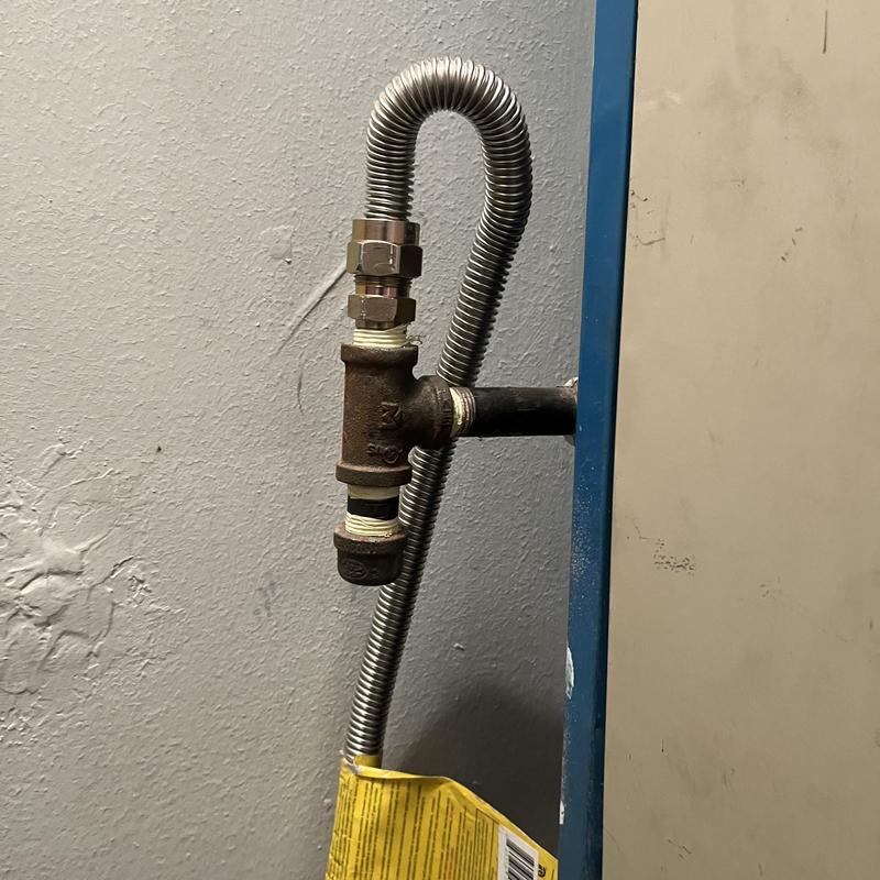 Gas shut off valve with flexible connector on furnace