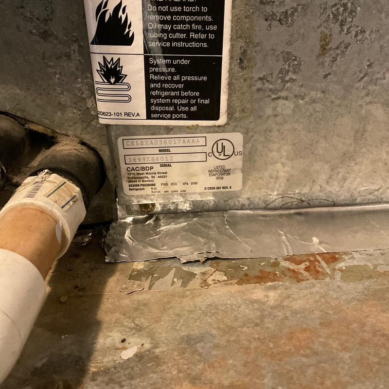 Air conditioning unit label and ductwork connection