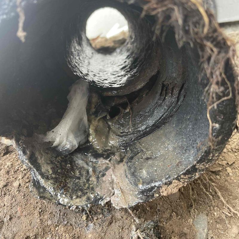 Cast iron pipe damage inside foundation crawlspace