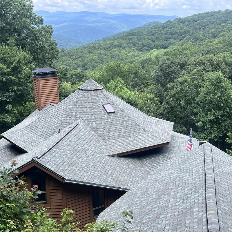 Architectural shingle roofing system on mountain home