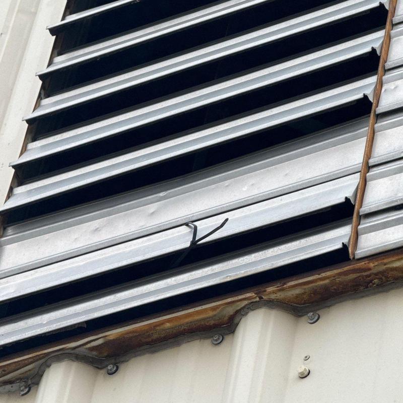 Metal window louvers with bent and dented slats