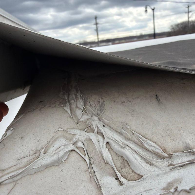 Modified bitumen roofing membrane with hail damage