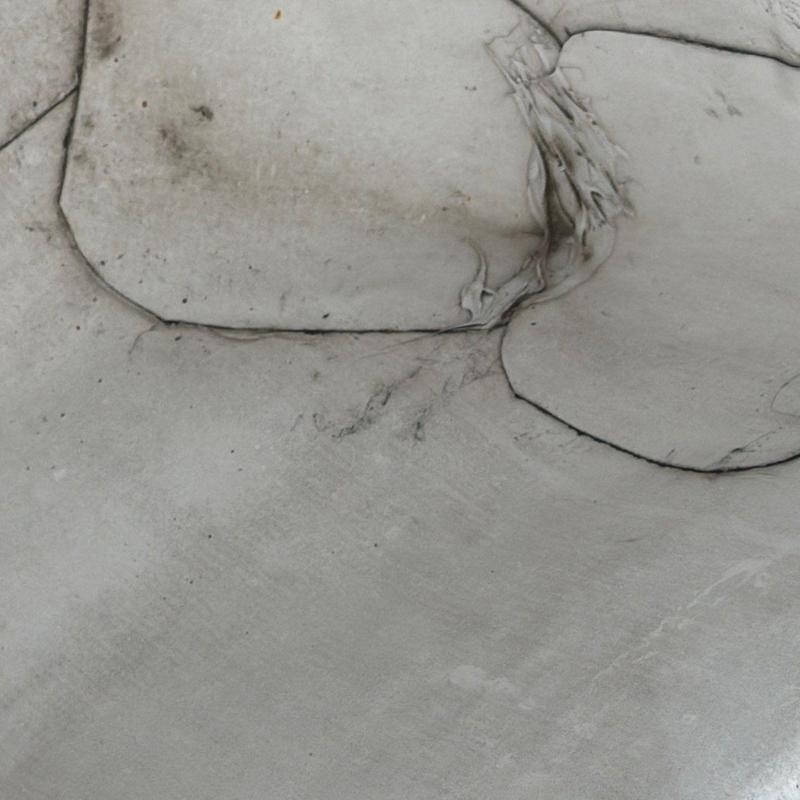 Metal roof panel with hail damage dents and warping