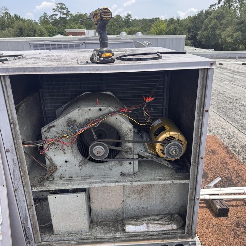 RTU blower motor and belts with drill on top