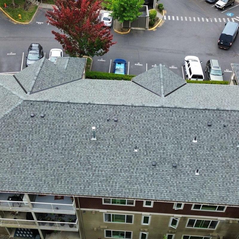 Asphalt shingle roof replacement on commercial building