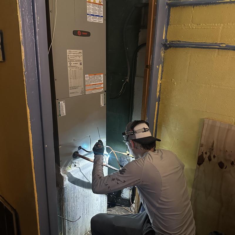Trane heat pump installation in utility room