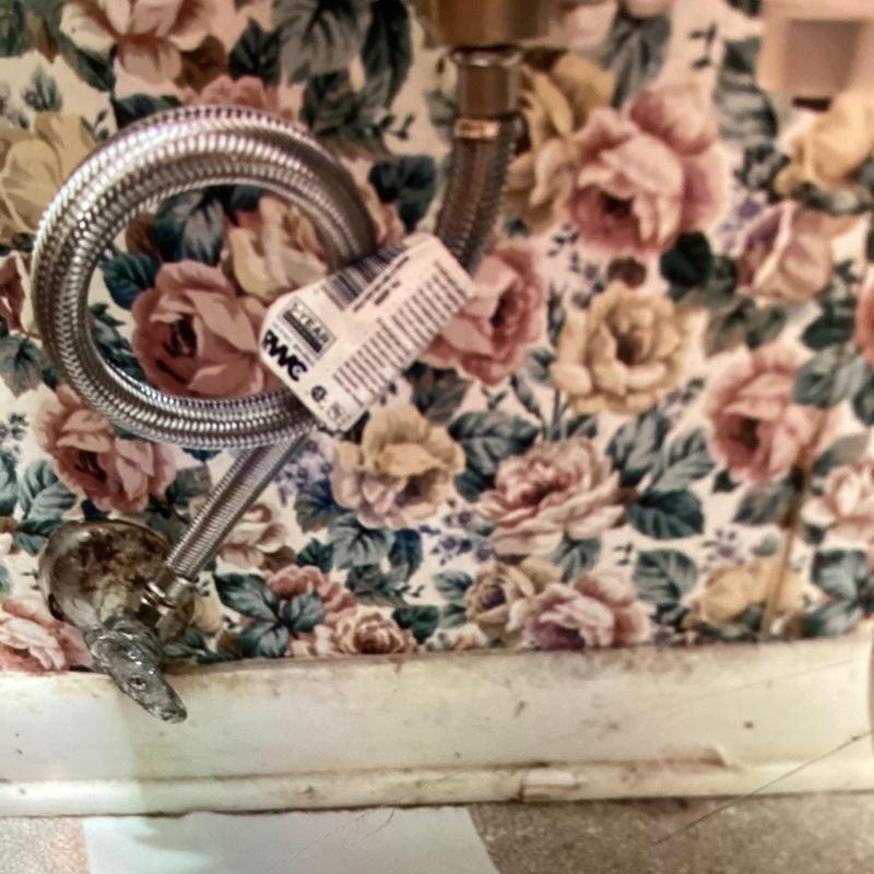 Toilet supply line with new flexible connector installed