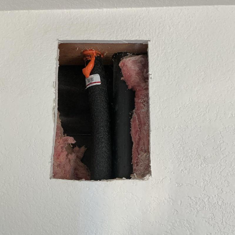 Cold water supply line reroute behind wall with insulation Cold water supply line reroute behind wall with insulation
