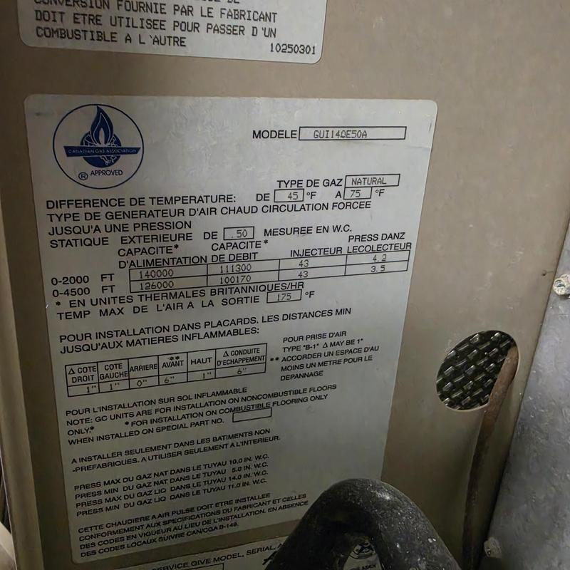 Amana furnace model GUI140E50A label close-up Amana furnace model GUI140E50A label close-up