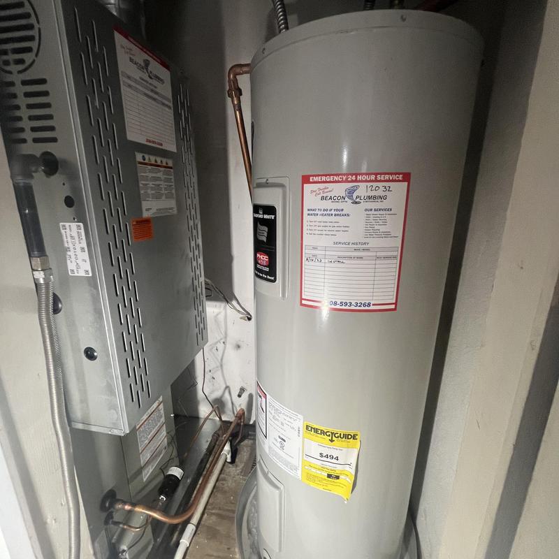 Water heater and HVAC system in utility closet Water heater and HVAC system in utility closet
