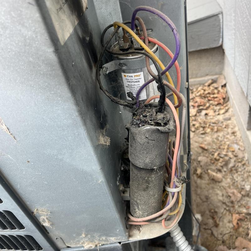 AC capacitor with burnt wiring and damage AC capacitor with burnt wiring and damage