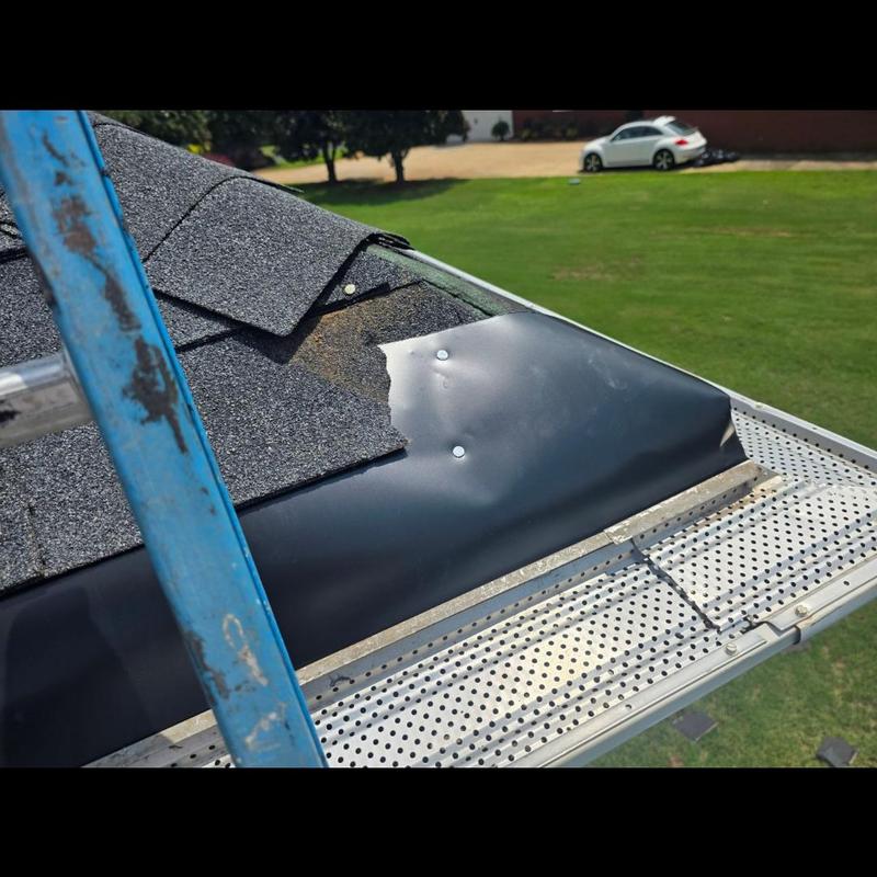 Roof hip metal flashing installation with surrounding shingles