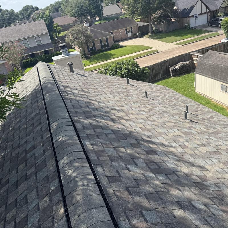 Architectural shingle roof with ridge vent installed