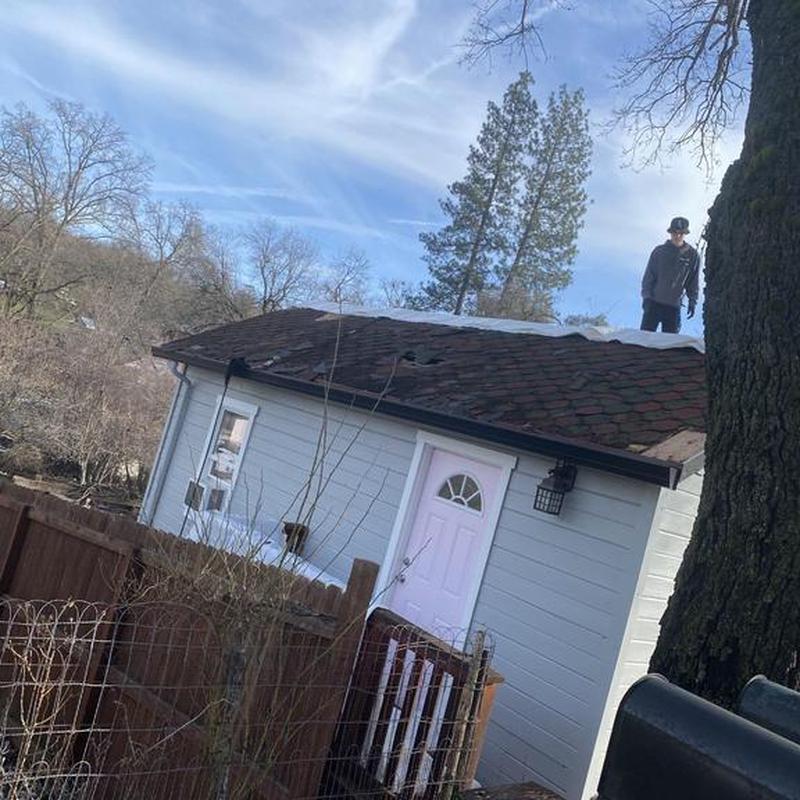 GAF asphalt shingle roof installation on small home