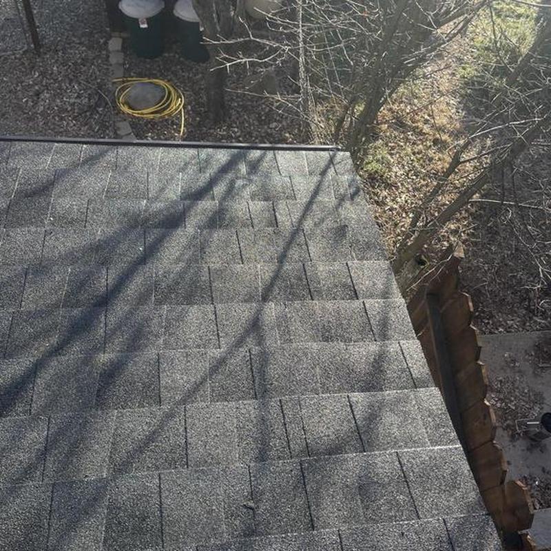 Gaf asphalt shingle roof installation with leaf shadows