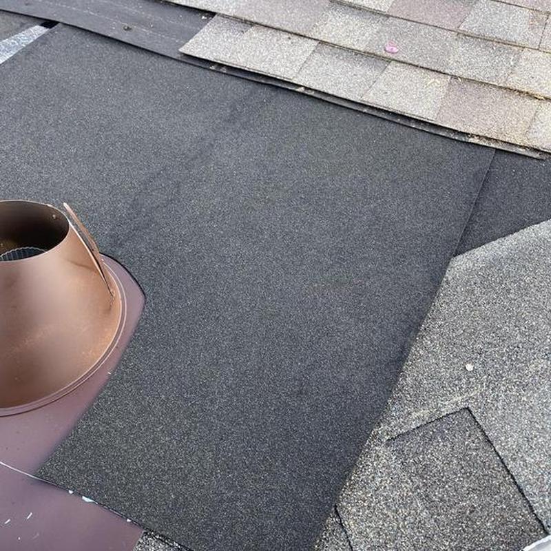 Asphalt roof patch with vent pipe flashing in Copperopolis