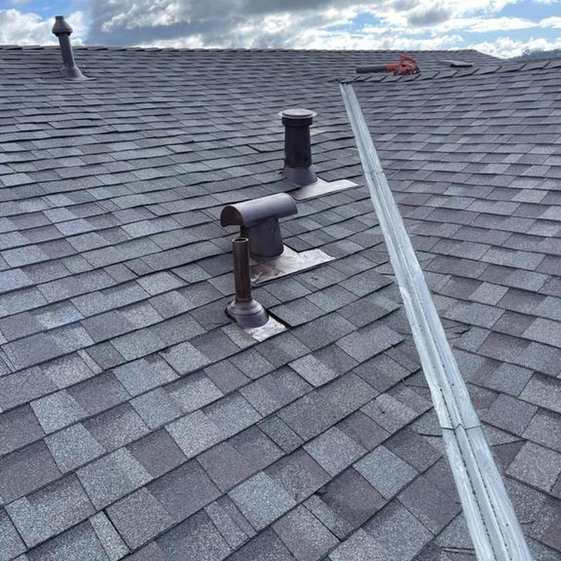 Asphalt shingle roof with vent pipe flashing Copperopolis