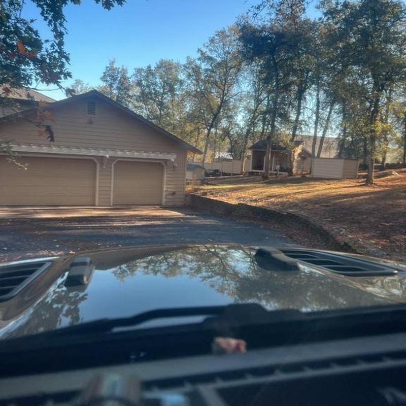 Asphalt shingle roof on suburban house in Sonora CA