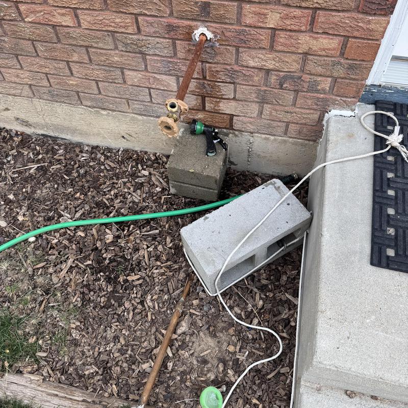 Frost free hose bib removed from house exterior wall Frost free hose bib removed from house exterior wall