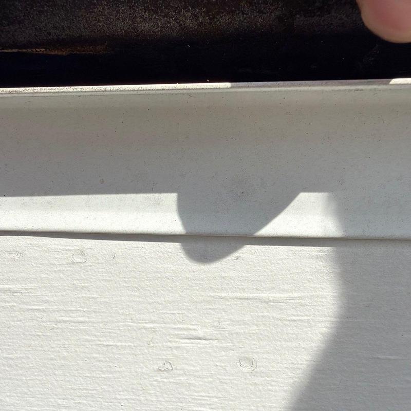 Roofing siding panel with minor dents and damage