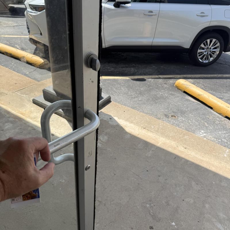 Storefront restaurant door lock and handle in use Storefront restaurant door lock and handle in use