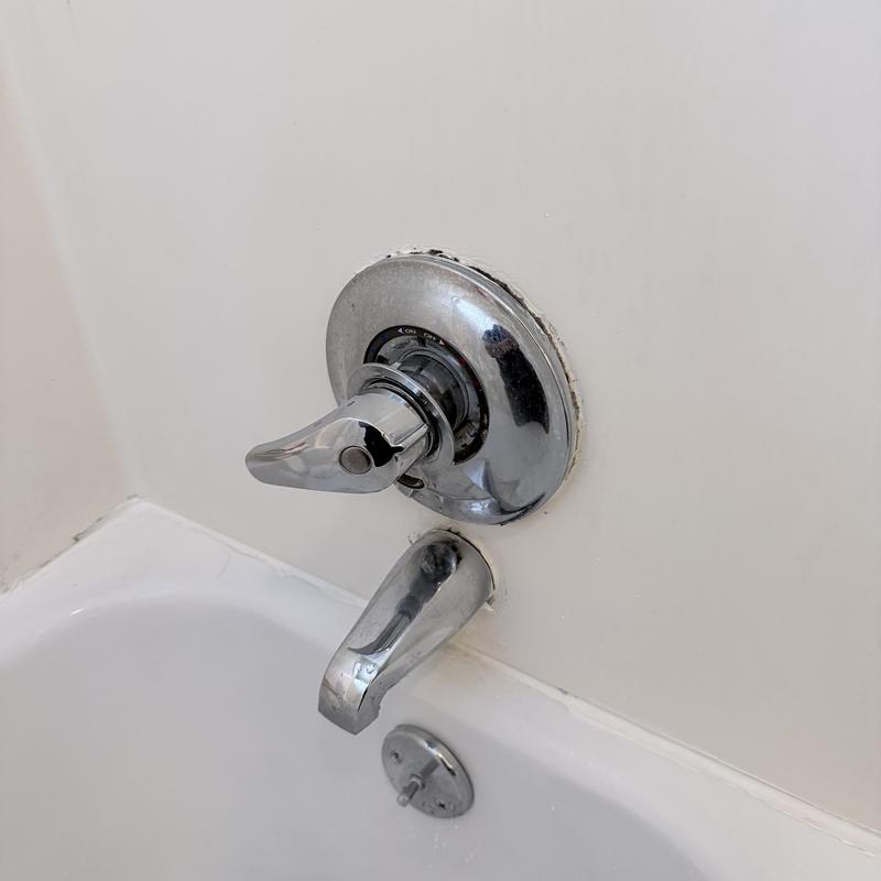 Shower valve and tub spout replacement in bathroom