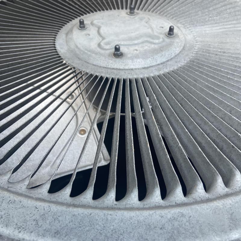 Outdoor air conditioner condenser fan grill close-up Outdoor air conditioner condenser fan grill close-up