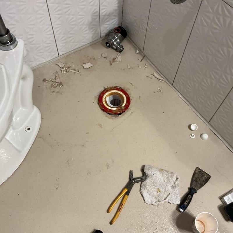 Toilet flange replacement with tools and debris Toilet flange replacement with tools and debris