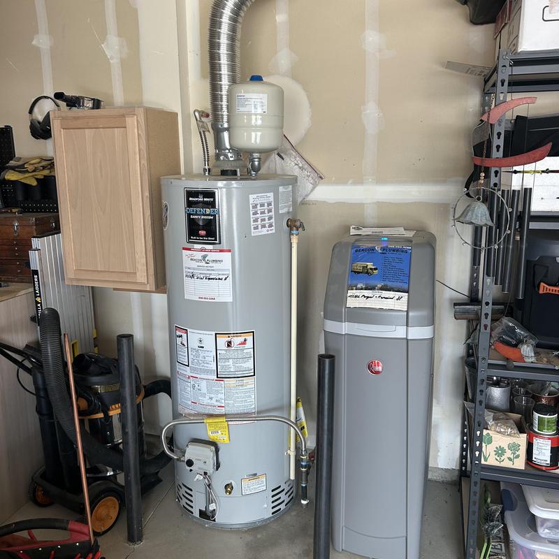 Water softener and expansion tank in garage setup Water softener and expansion tank in garage setup