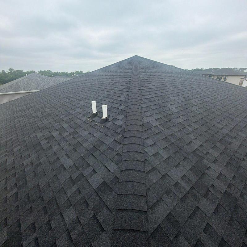 Asphalt shingle roof with vent pipes, no damage found Asphalt shingle roof with vent pipes, no damage found