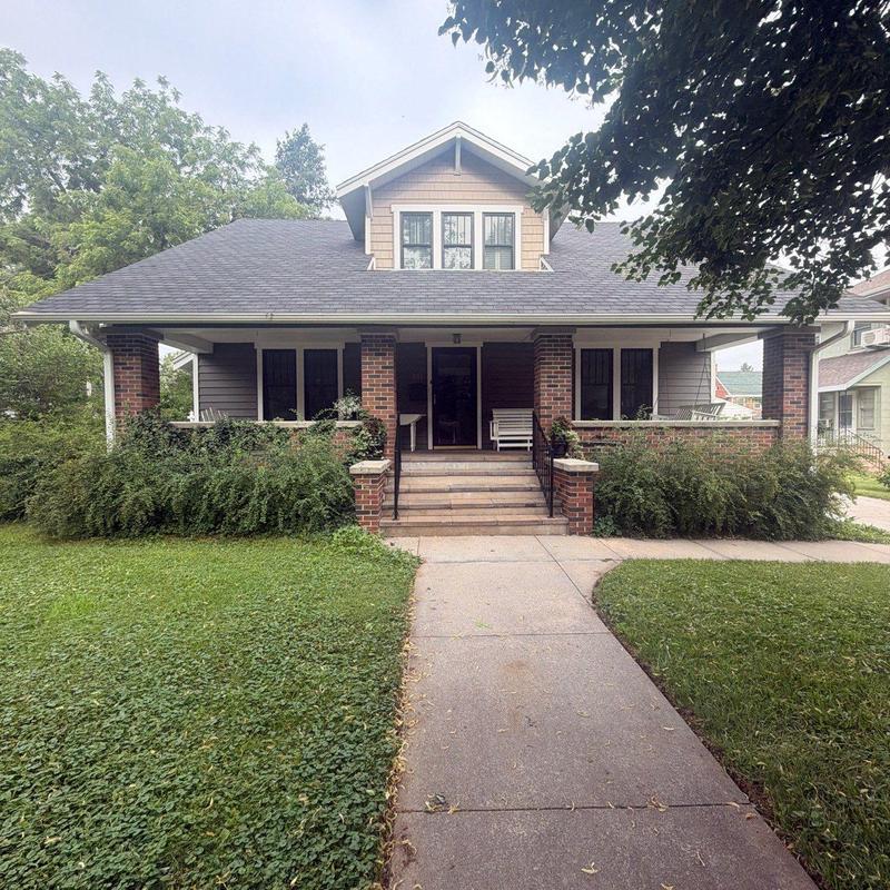 Asphalt shingle roof inspection on residential home Asphalt shingle roof inspection on residential home
