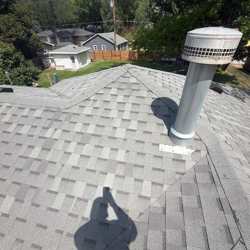 Asphalt shingle roof with vent pipe and flashing Asphalt shingle roof with vent pipe and flashing