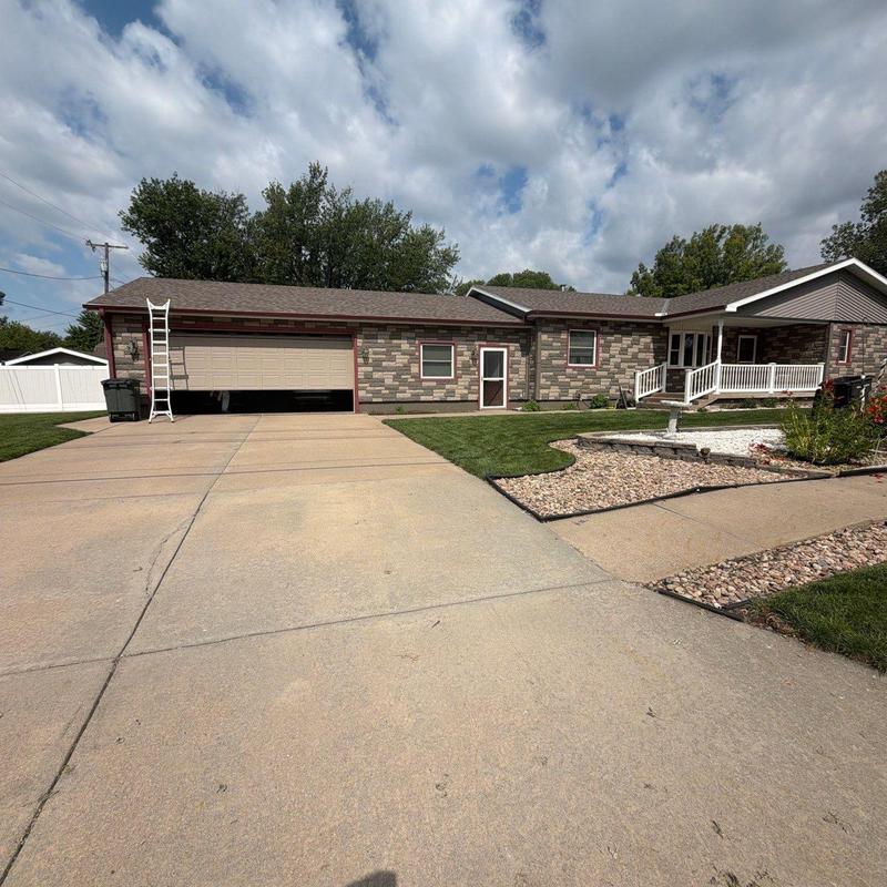 Asphalt shingle roof inspection with ladder on driveway Asphalt shingle roof inspection with ladder on driveway