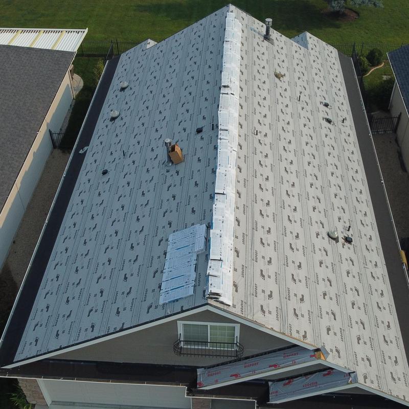 Bigfoot synthetic roof underlayment on residential roof Bigfoot synthetic roof underlayment on residential roof