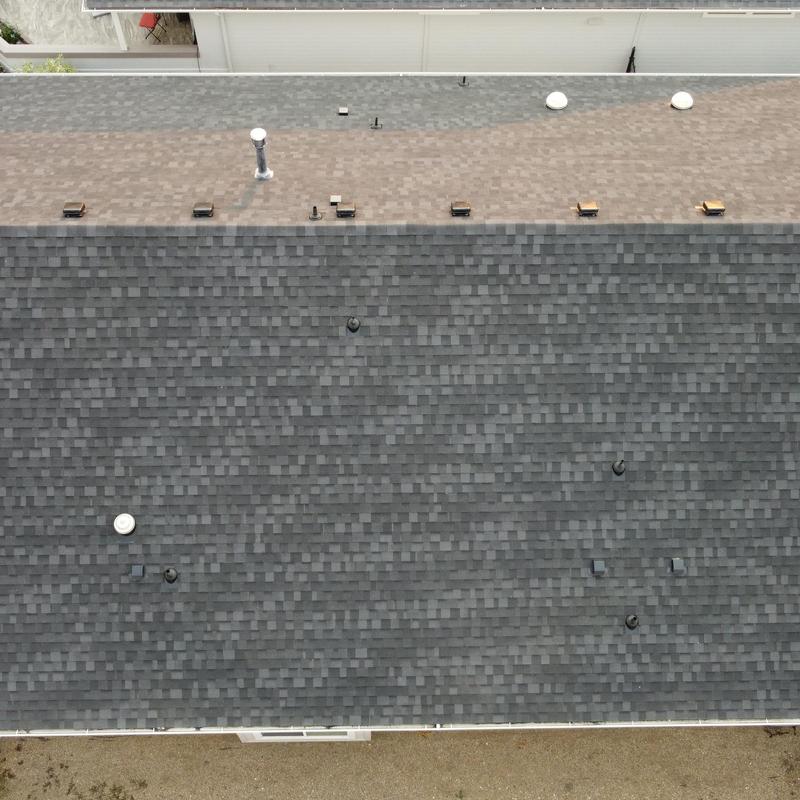 IKO Dynasty shingle roof with vents and pipes IKO Dynasty shingle roof with vents and pipes