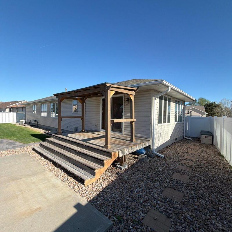 Wooden deck and steps with pergola structure Wooden deck and steps with pergola structure