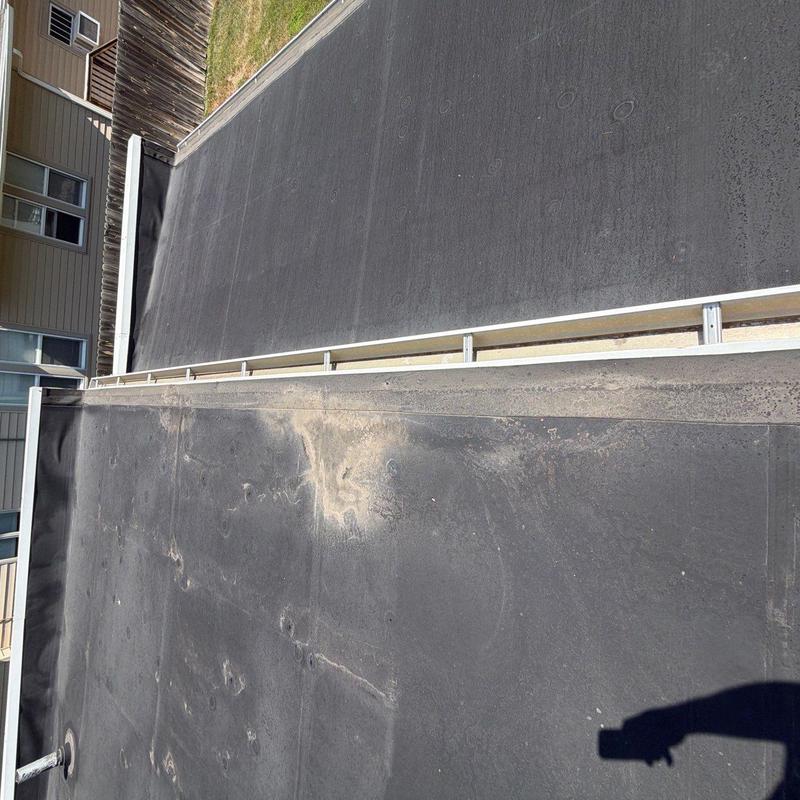 Flat roof membrane with light surface wear in Hastings Flat roof membrane with light surface wear in Hastings