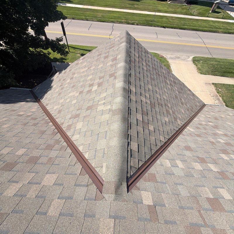 Asphalt shingle roof ridge inspection with no damage found Asphalt shingle roof ridge inspection with no damage found