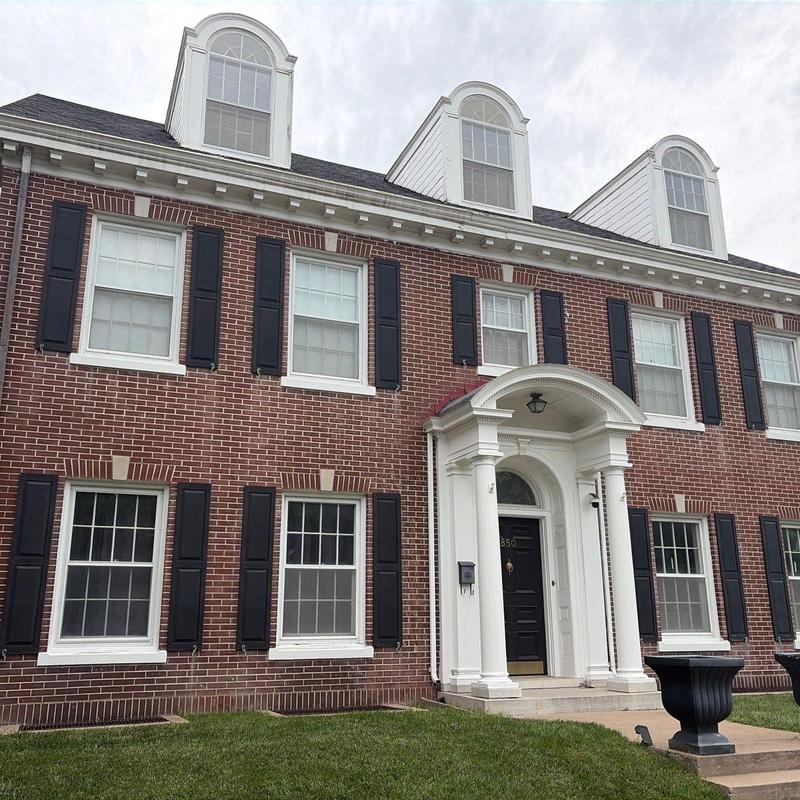 Asphalt shingle roof inspection on brick townhouse Asphalt shingle roof inspection on brick townhouse