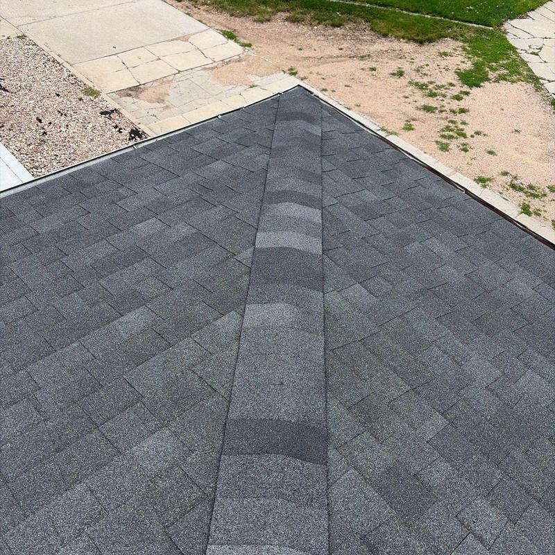 Asphalt shingle roof ridge inspection with no damage found Asphalt shingle roof ridge inspection with no damage found